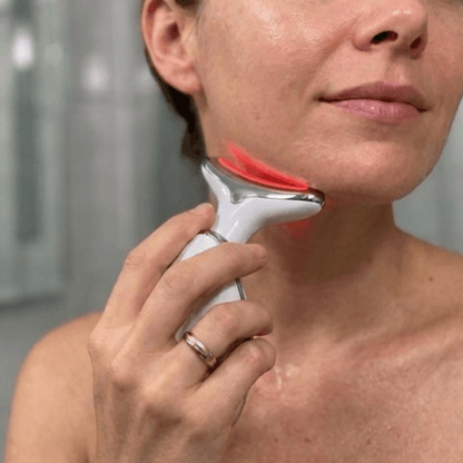 Masajeador cara y cuello LED y vibración plateado